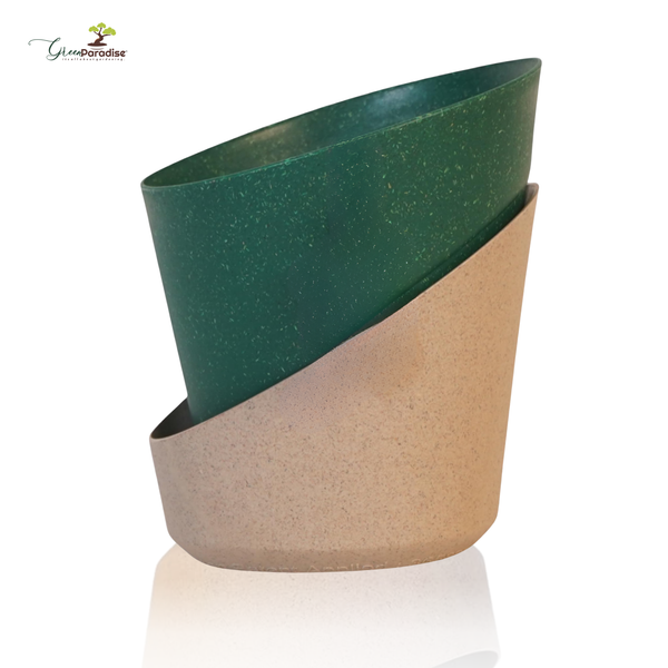 Two-tone green and beige planter on a white background